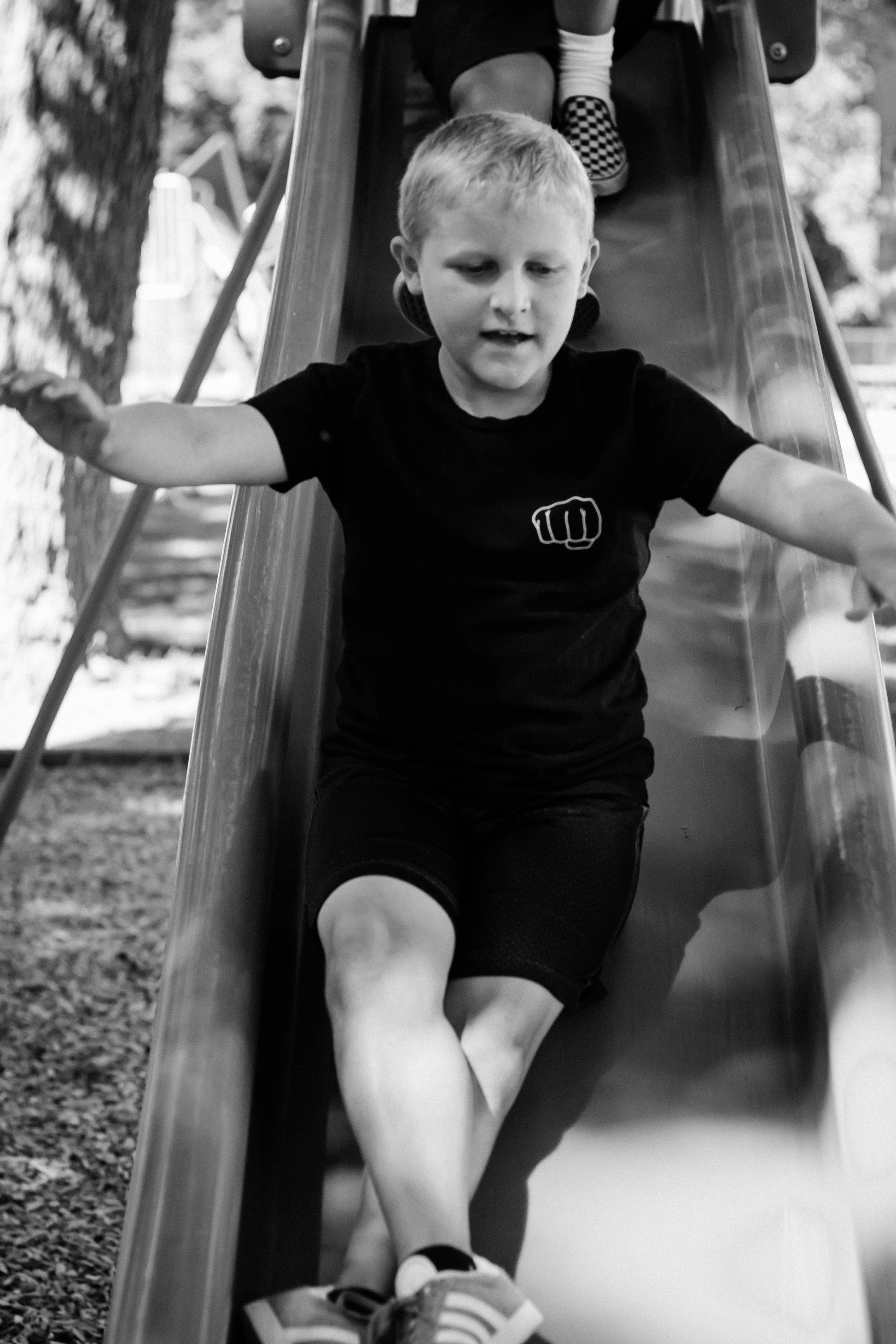 Smash Youth Short Sleeve T-Shirt Boy on Slide