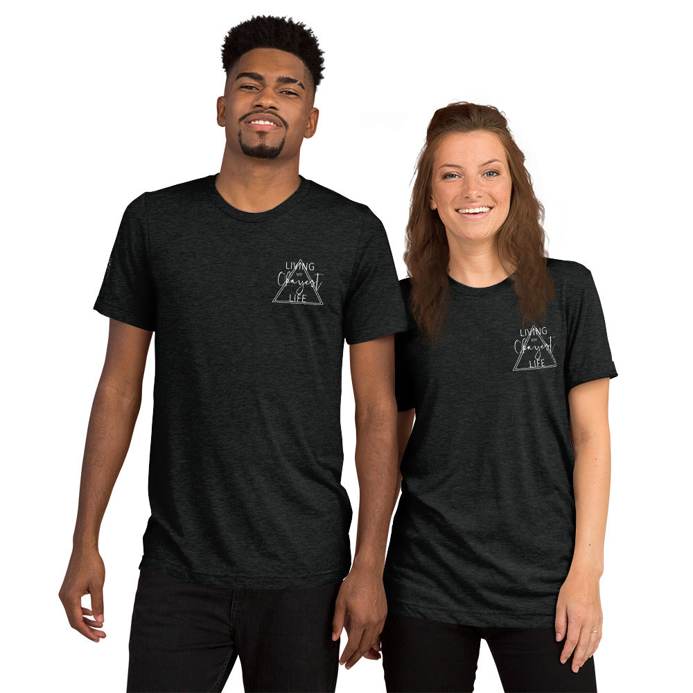 Couple wearing matching charcoal black Okayest Life t-shirts