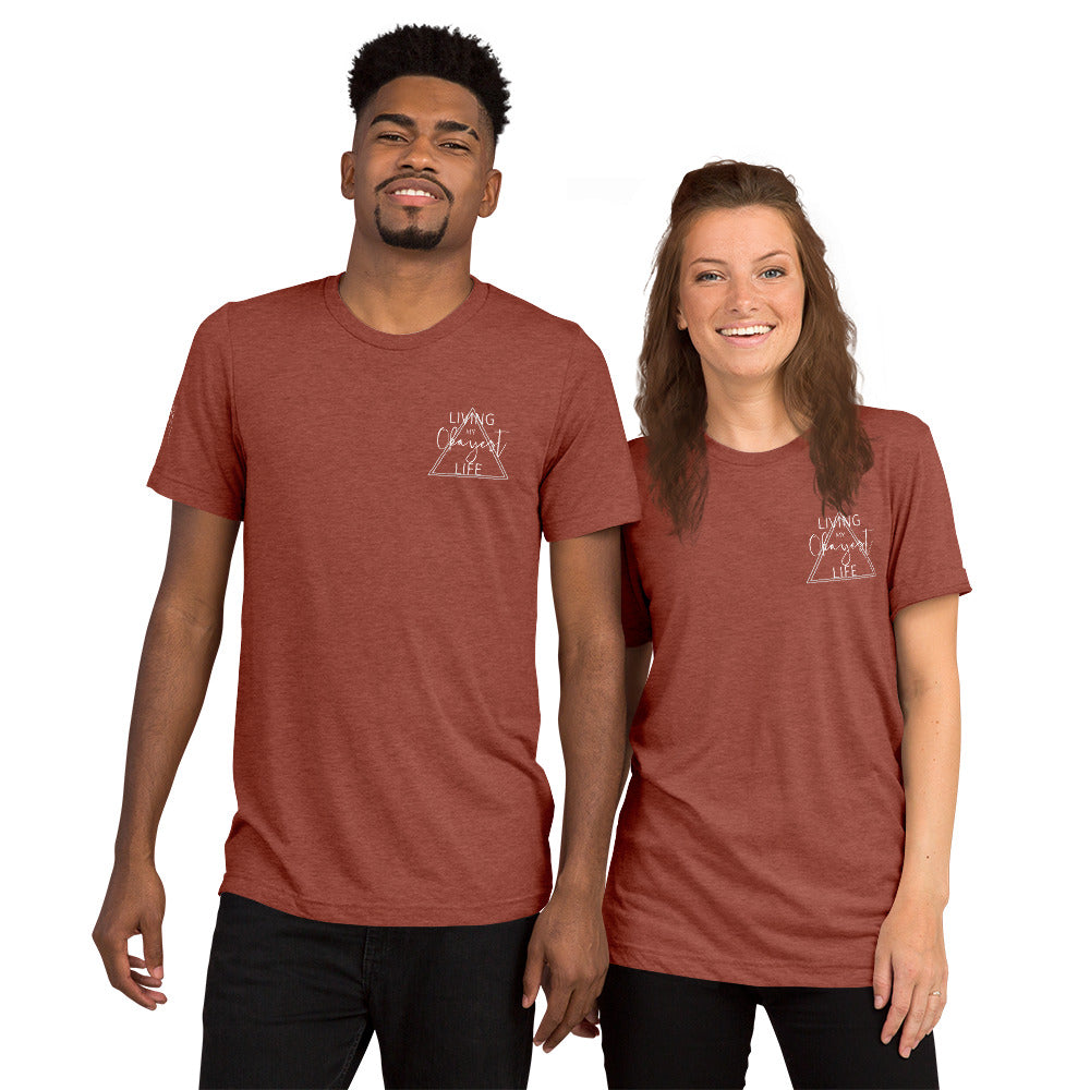Couple wearing matching clay Okayest Life t-shirts