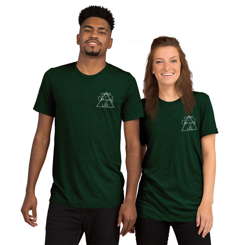 Couple wearing matching emerald Okayest Life t-shirts