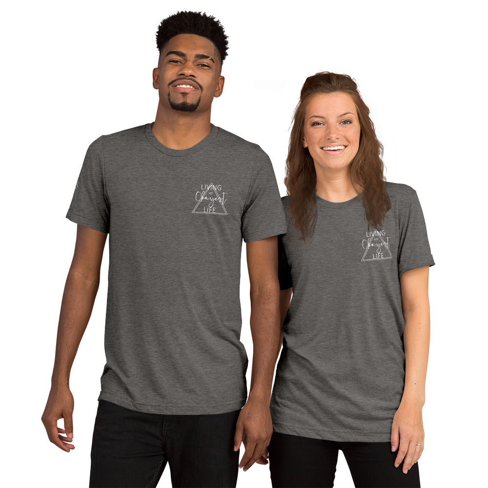 Couple wearing matching grey Okayest Life t-shirts