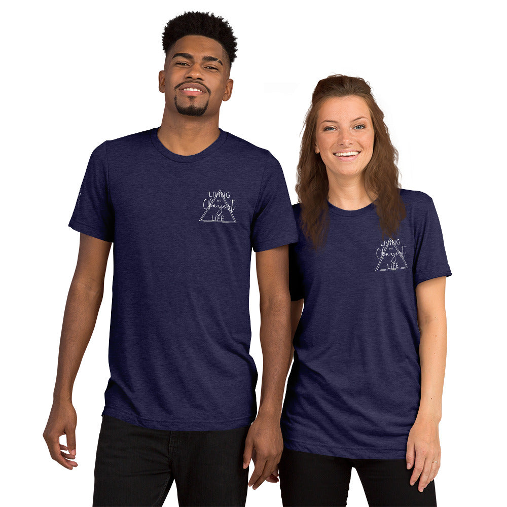 Couple wearing matching navy Okayest Life t-shirts